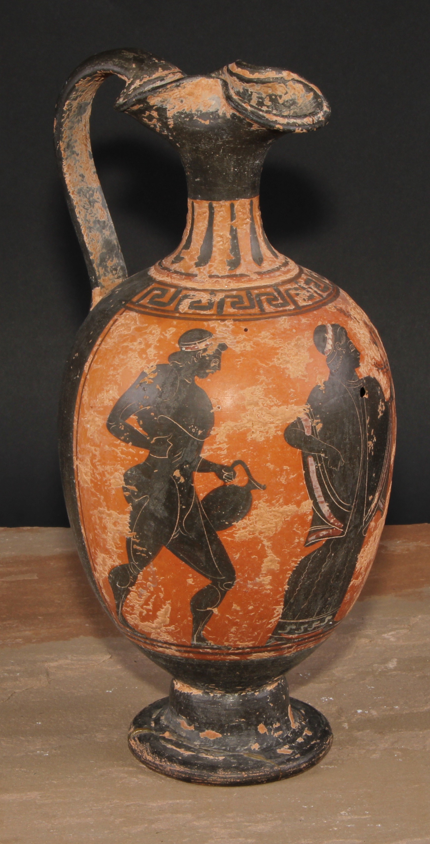 A Grand Tour ovoid pedestal ewer, after an ancient Greek  oinochoe, painted with figures after the antique, 31cm high