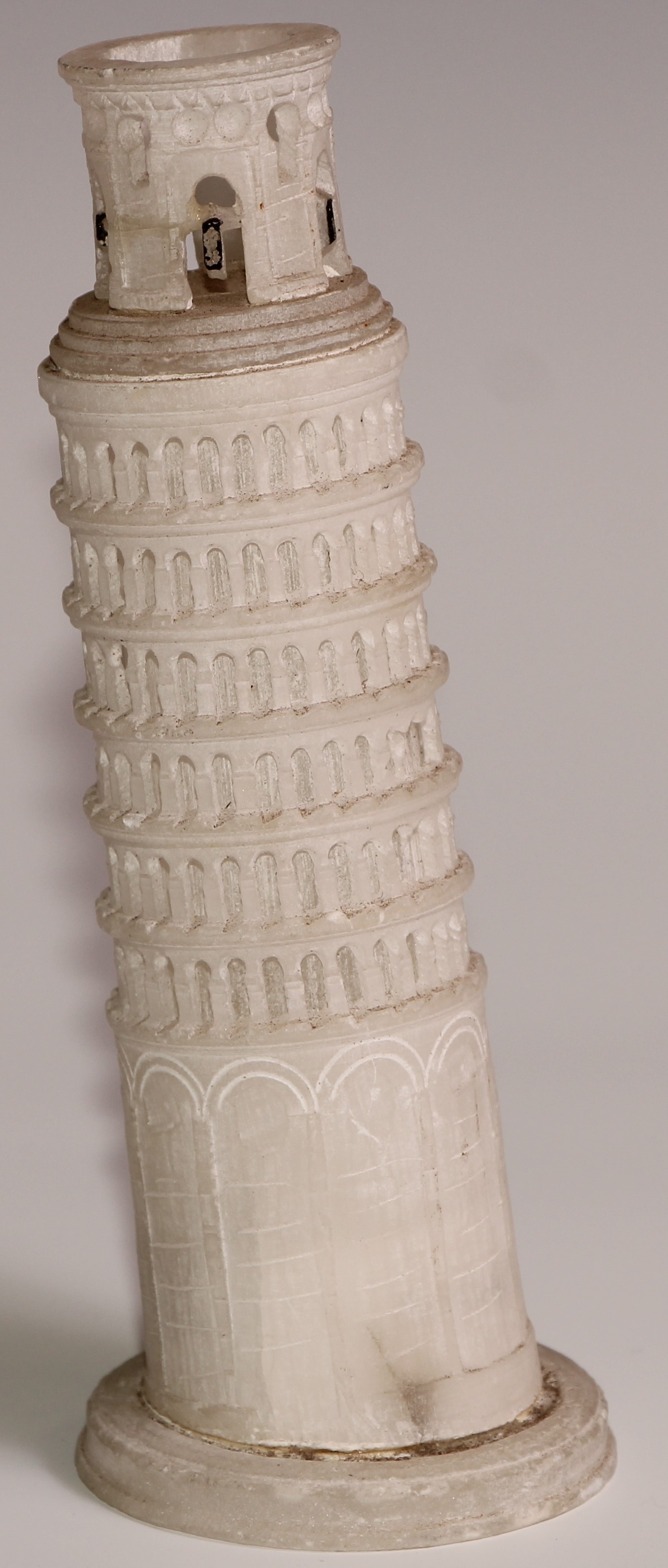 An alabaster Grand Tour library desk model of the Leaning Tower of Pisa, 15cm high