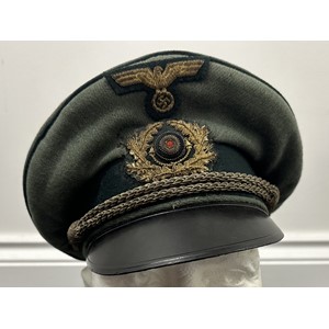 WW2 Third Reich KM Coastal Artillery Officers Schirmmutze Cap in Trikot wool with gilt wire bullion insignia and silver cap cords. KM Fouled Anchor Cap Cord Buttons. Black rayon lining with celluloid sweat shield. Brown leather sweatband. Size approx. 59.