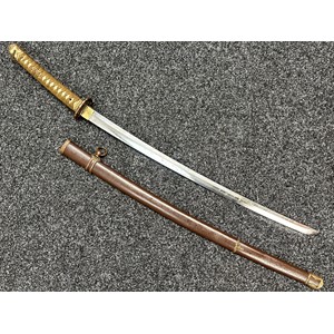 WW2 Imperial Japanese Army Officers Shin Gunto Sword with single edged blade 692mm in length. Signed tang. Overall length 957mm. Complete with scabbard.