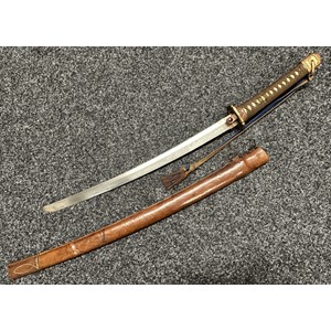 WW2 Japanese Officers Shin Gunto Katana Sword with single edged blade 535mm in length. Tang has two holes and is unsigned. Brass Tsuba. Overall length 770mm. Company Grade Officers Blue/Brown sword tassel. Brown leather covered Saya.