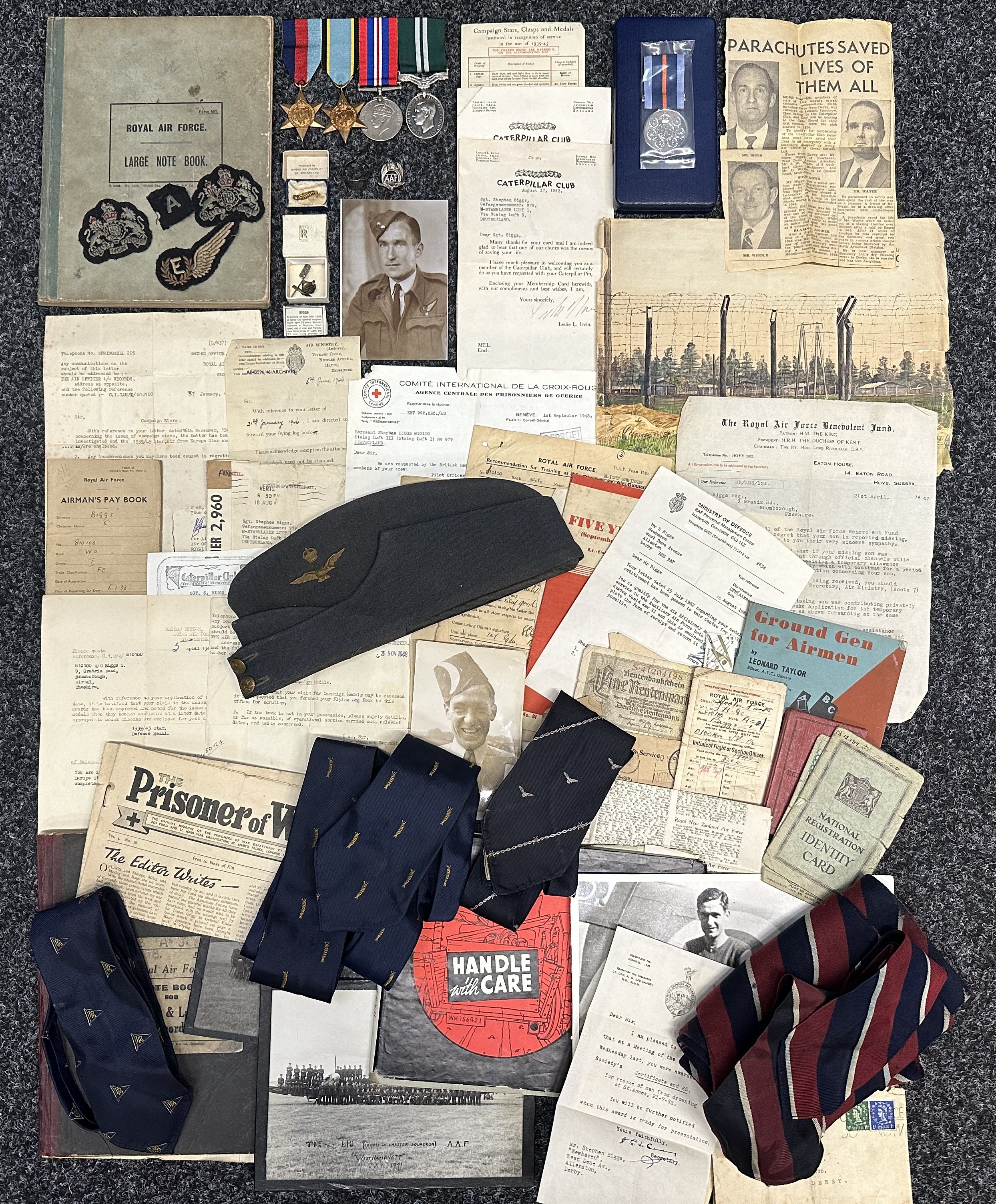 WW2 British RAF Caterpillar Club PoW Medal Group to 810100 Sgt. Stephen Biggs RAFVR, Flight Engineer 103 Squadron RAF comprising of : 1939-45 Star, Air Crew Europe Star, War Medal and Air Efficiency Award all mounted on a bar, together with Medal Award Slip, named Caterpillar Club Membership badge in box of issue with award slip dated August 1943 and second letter from Irving dated 1945, AAF Lapel Badge, Silver RAF Sweetheart Ring Jerusalem Palestine, Flight Engineers Brevet, Warrant Officers Rank badges, WO's Field Service Cap dated 1944, Post War Unofficial Bomber Command Medal is box of issue, reprint photo of him in uniform, medal award correspondence, letters to his Mother from crew mates families, RAF Large Note book with technical notes, Caterpillar Club ties x 2, RAF PoW Association tie and other RAF ties, RR tie and lapel badges, RAF scarf, Water colour picture of PoW Camp, Book of PoW Cartoons, photos, etc.  https://www.northlincsweb.net/103Sqn/html/p-o_james_o_b_mooney_103_squadron.html