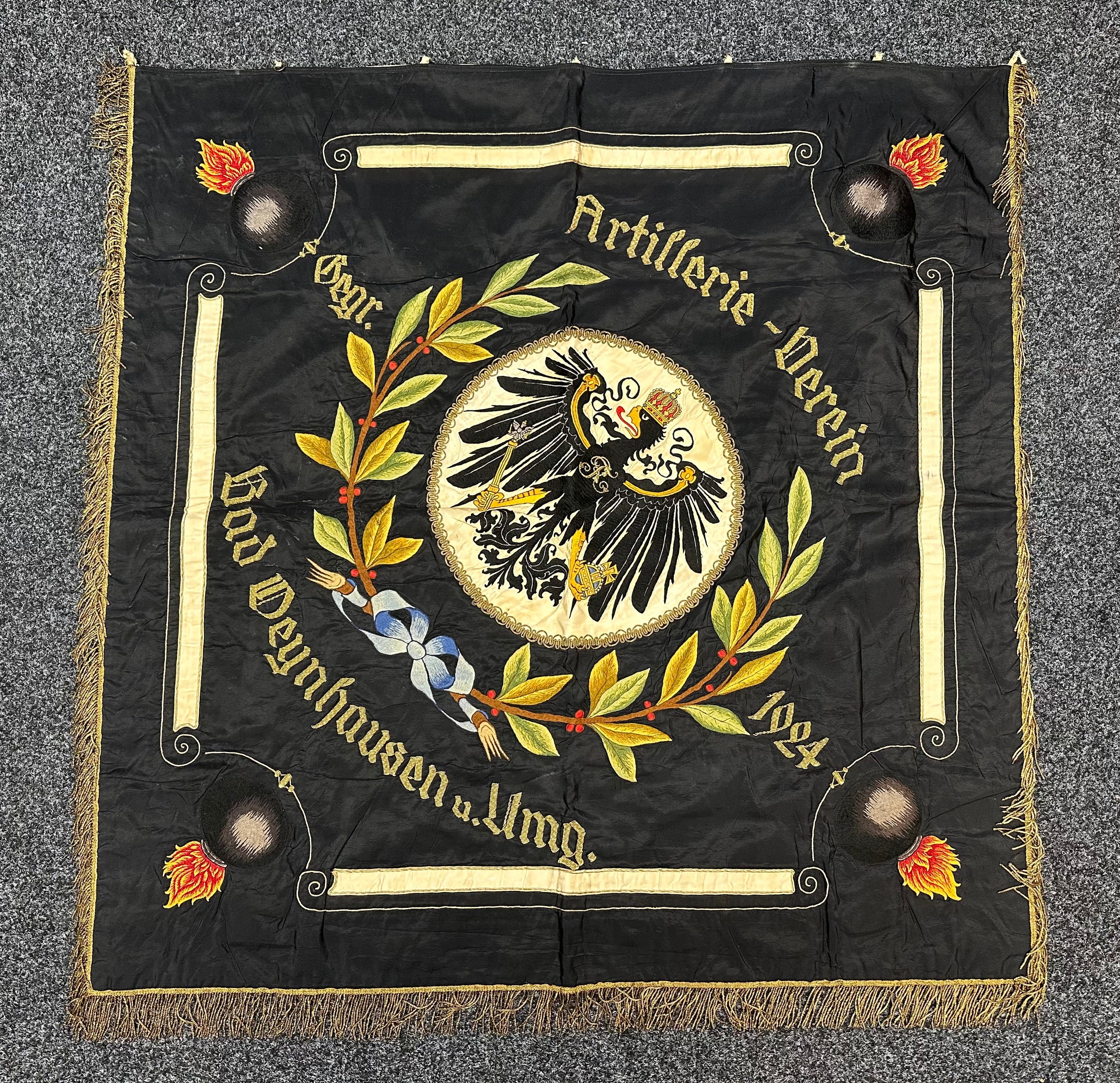 WW1 Imperial German Army Artillery Veterans Association Bad Oyenhausen Hand Embroidered Silk Banner. Double sided banner hand embroidered in silk and gilt wire bullion thread. Complete with original suspension rings. Size 120cm x 120cm including gilt wire fringe. New to the market, war souvenir of a WW2 British Veteran.