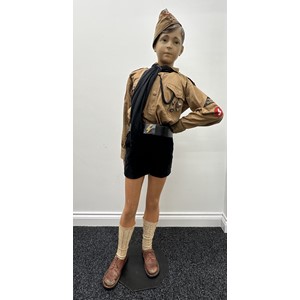 WW2 Third Reich Deutche Jungvolk Mannequin comprising of: vintage mannequin: HJ Summer cap with RZM paper label, size 58: Brown shirt with full insignia, shoulder straps, area triangle for West Westfalen, DJ Rune, Glider Qualification badge, : Belgian made black corduroy shorts: SS marked whistle on black lanyard: HJ enamel membership badge RZM marked: DJ Shooting award RZM marked: DJ Belt and buckle, both unmarked. (Neckerchief and leather woggle are modern). Socks and shoes.