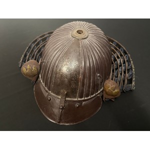Japanese Samurai Kabuto Helmet with signature to front and signature to the interior. Red lacquer to the underside of the peak. Has cloth liner, which is detatched in places and is complete with the neck guard. Comes with a modern reproduction resin Dragonfly insignia for the front.