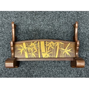 Japanese Sword Stand for three swords. Wooden. Decorated with gilt Bamboo designs. Height 34.5cc, width 53cm, depth 19cm.