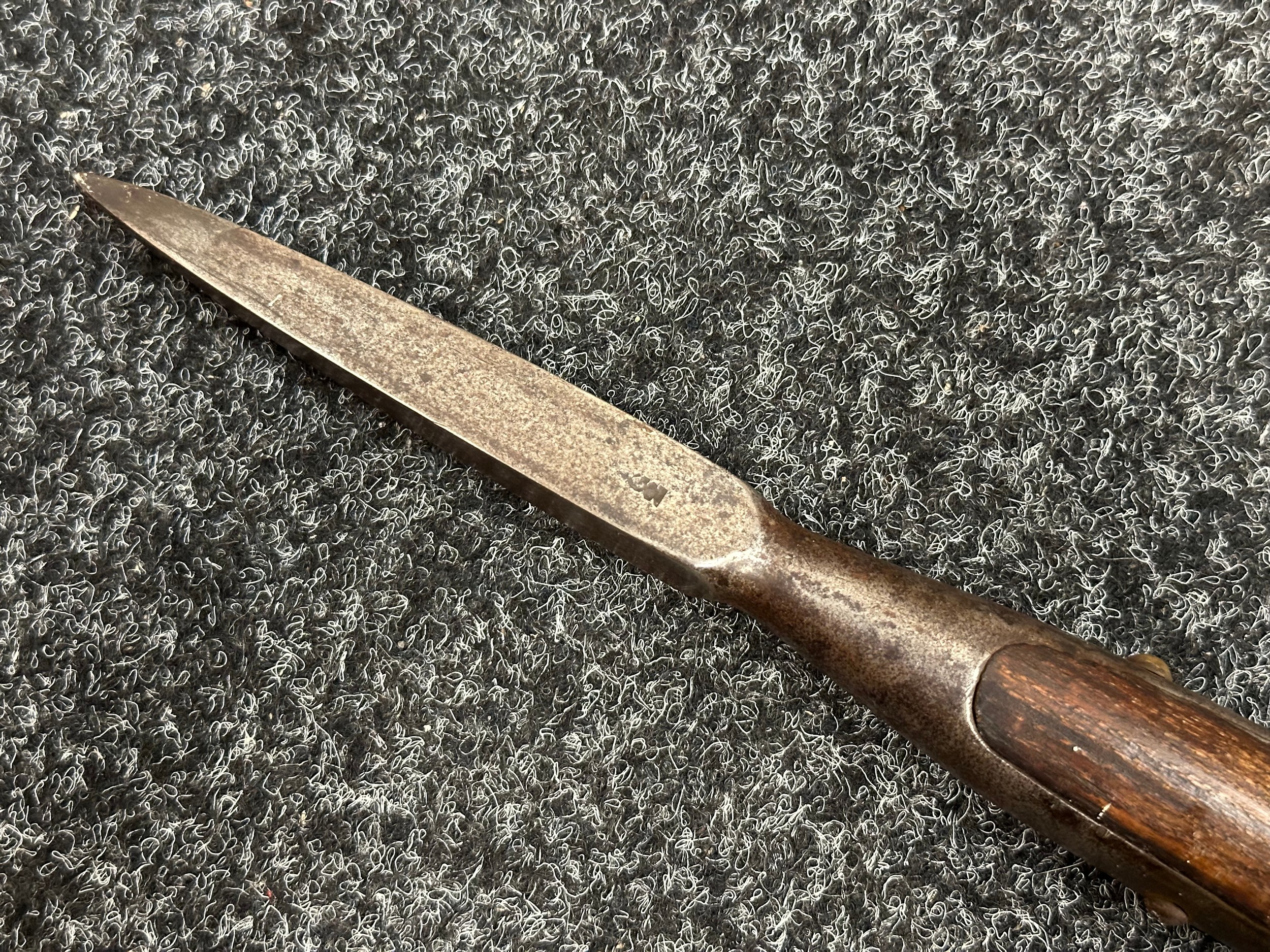 Early 19th Century M1800 Royal Navy Boarding Pike. 7 foot 9 inches in length. Spear point is four sided and marked "G2" along with a single letter "T". 4 brass securing screws to the langet. Steel butt shoe to the end with three securing screws to the langet. Wood is inspection marked.