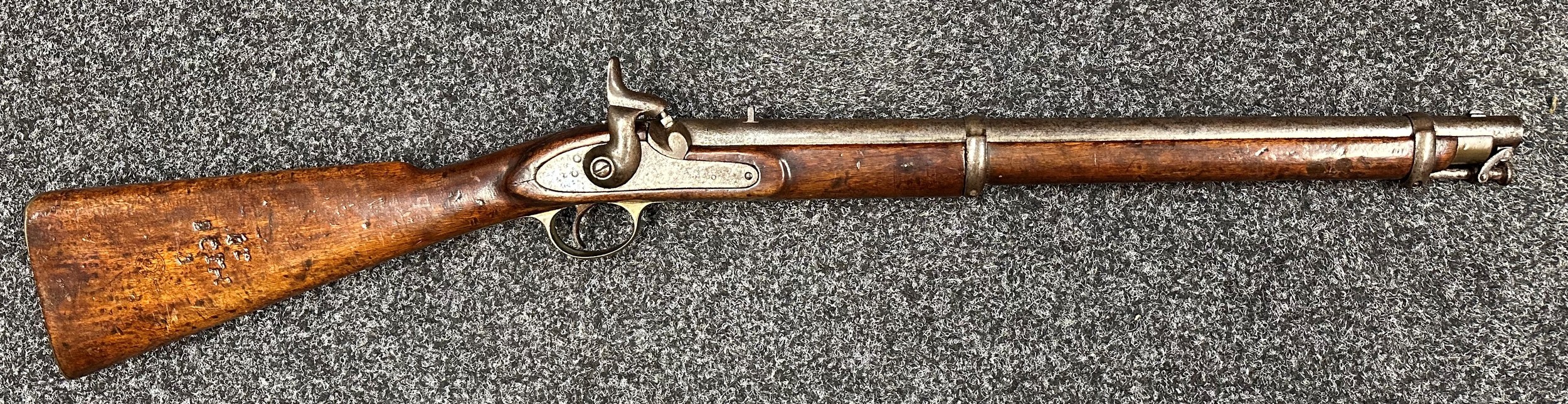 Percussion Cap 1856 Pattern Enfield Cavalry Carbine. No serial number. Barrel length 530mm. Overall length 930mm. Working action which holds at both half and full cocked positions. Enfield marked to butt along with unit markings. NOTE: Section 58 (2) No licence required in the UK.
