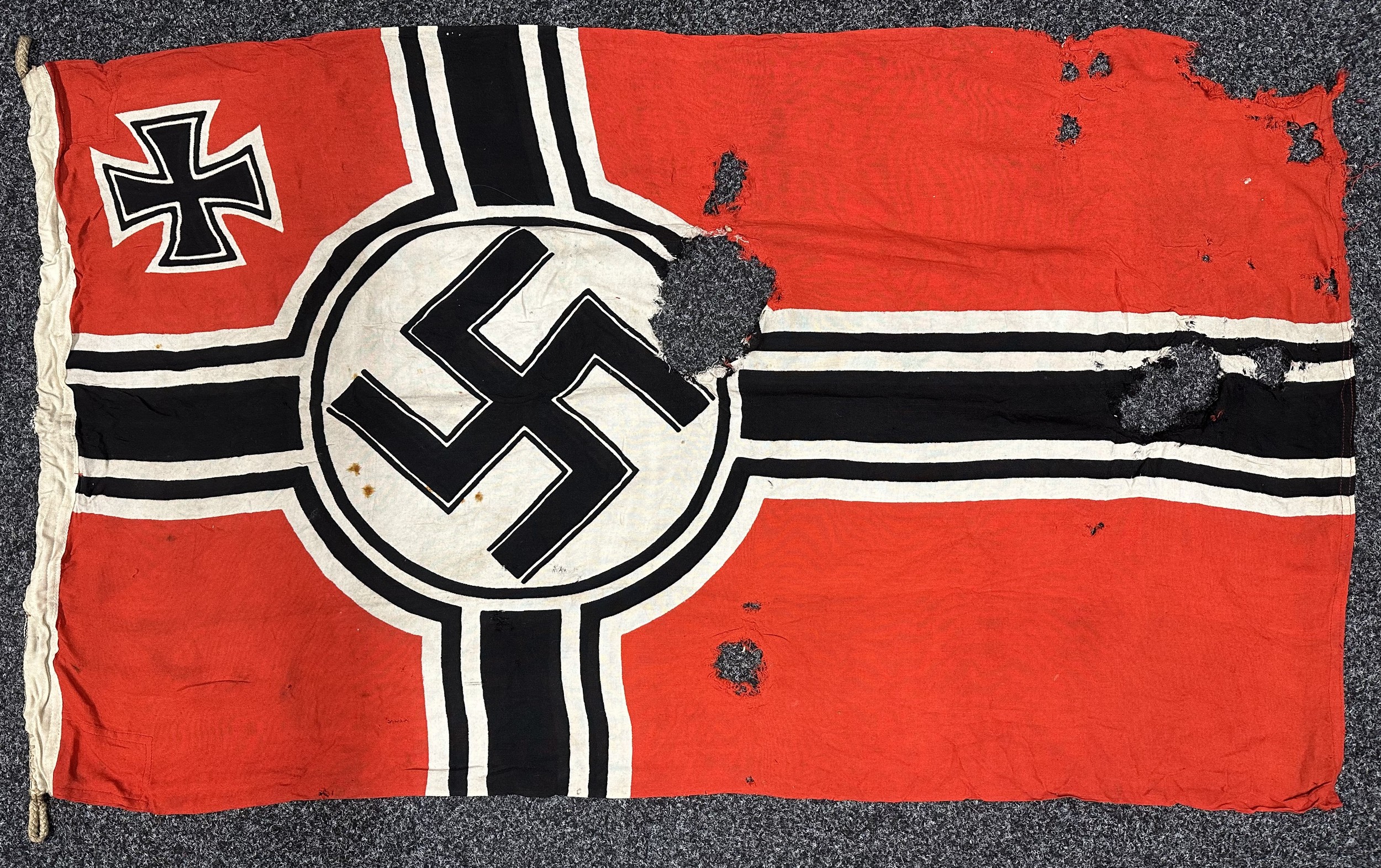 WW2 Third Reich Reichskriegsflag in relic condition. Well marked with KM Eagle M acceptance stamp along with size marking 0,8 x 135. The 80x135cm sized flags were used on vessels up to 500 tons, including U-Boats and E-Boats and tugs. New to the market, war souvenir of a member of the Royal Marines.
