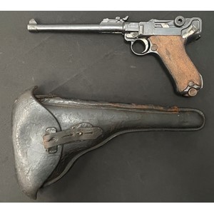 Deactivated WW1 German 9mm Artillery Luger Pistol serial number 3616. Maker marked DWM. Dated 1917. All matching serial numbers. Complete with matching numbered magazine and in it's original 1915 dated holster which is also complete with original take down tool and a British issue brass cleaning rod. Barrel length 180mm. Overall length 315mm. Current UK/EU Deactivation certificate issued in 2023. No licence required in the UK.
