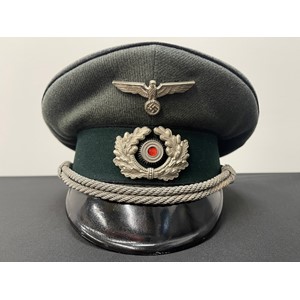 WW2 Third Reich Heer Pioneer Officers Schirmmutze cap. Trikot material. This is an enlisted mans or NCO's cap which as been upgraded with Officers buttons and chinstrap. Size 55. Cap spring in place.