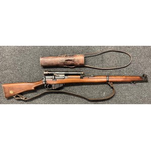 Deactivated WW1 British SMLE MKIII* Sniper Rifle serial number 71487. BSA maker marked and dated 1917. Brass Disc to butt marked "LINC 78". Fitted with Telescopic Sight by "Periscope Prism Company Ltd". Mounts marked "P8756" and "Patent 3027/1915". Complete with leather sling and front sight cover and leather case for the telescopic sight. Current UK/EU Spec. No licence required.