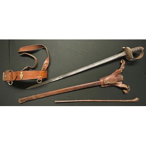 Victorian British Heavy Cavalry Officers Sword and Sam Brown Belt. Sword has decorated etched single edged fullered blade 887mm in length. Proof marked along with retailers mark "W. Anderson & Sons, 17, George Street, Edinburgh", etched panel with Queens Crown and VR, opposite side of the blade has etched panel with "Lothian & Berwickshire Yeomanry". Steel guard pierced with honeysuckle pattern design. Wire bound Shagreen grip. Overall length 104cm. Complete with leather frog and scabbard. Sam Brown belt has a name written in ink which appears to read "Rodney Thewell". In addition there is an officers brown leather covered swagger stick 71cm in length. (3)