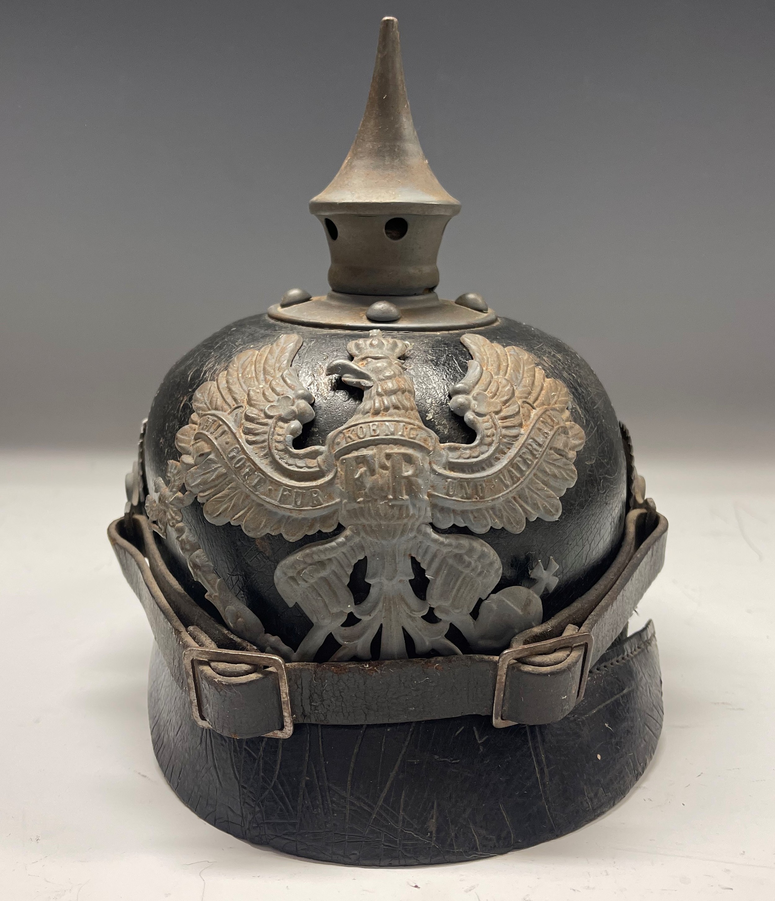 WW1 Imperial German Army M1915 Pickelhaube Helmet with Prussian Helmet Plate and State and National Cockades. Complete with chinstrap. Liner is complete. Dated 1915 and with a faint makers mark ink stamp to the crown.