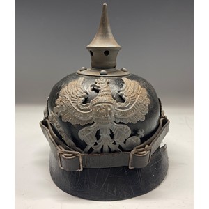 WW1 Imperial German Army M1915 Pickelhaube Helmet with Prussian Helmet Plate and State and National Cockades. Complete with chinstrap. Liner is complete. Dated 1915 and with a faint makers mark ink stamp to the crown.