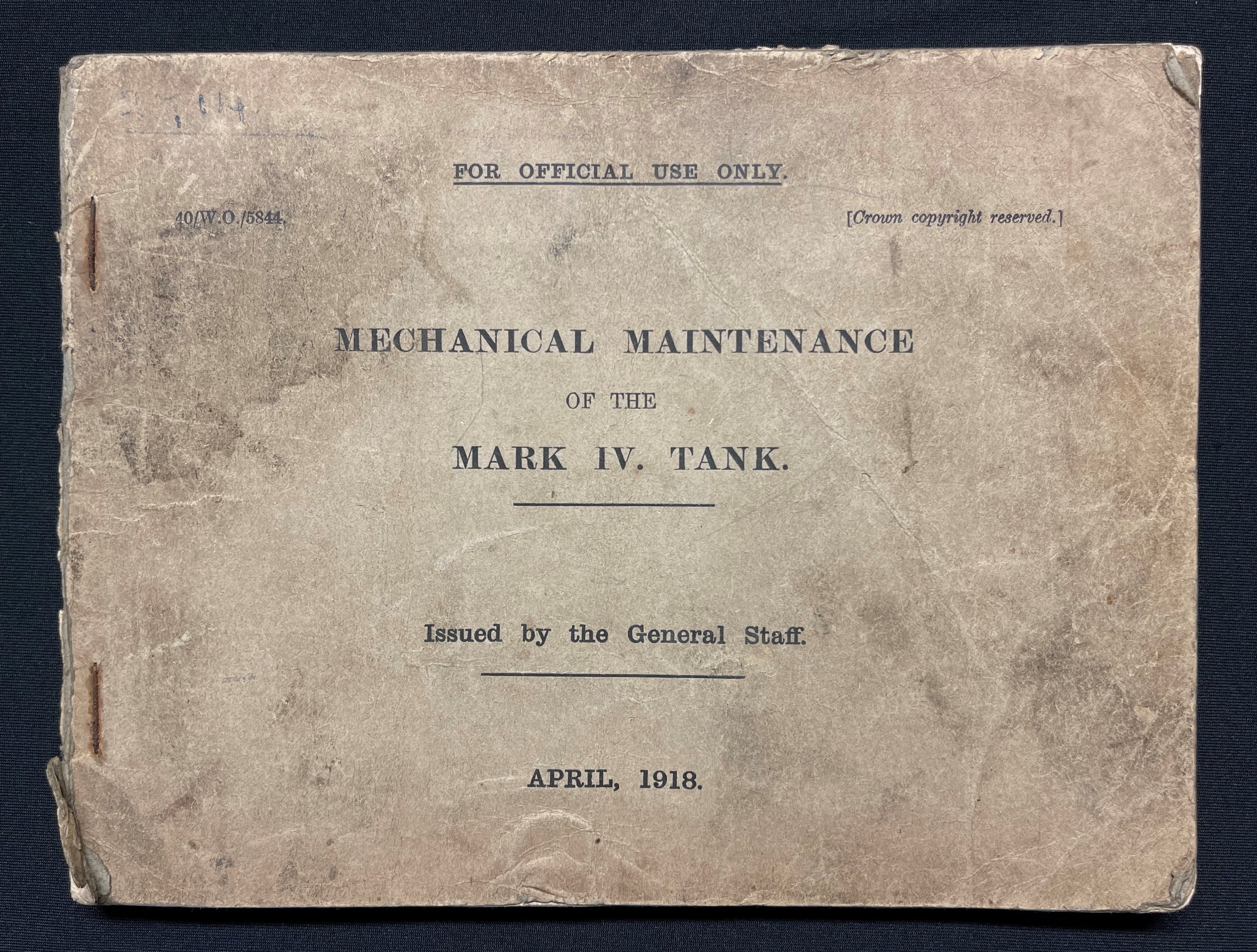 WW1 Rare British Tank Manual: Mechanical Maintenance of the Mark IV Tank, issued by the General Staff, April 1918. War Office Reference number: 40/WO/5844. Size 215mm x 165mm. Over 100 pages including line drawings showing how to replace the tracks, use of the portable tank loading crane, etc. Contained in a black leather and celluloid folder.