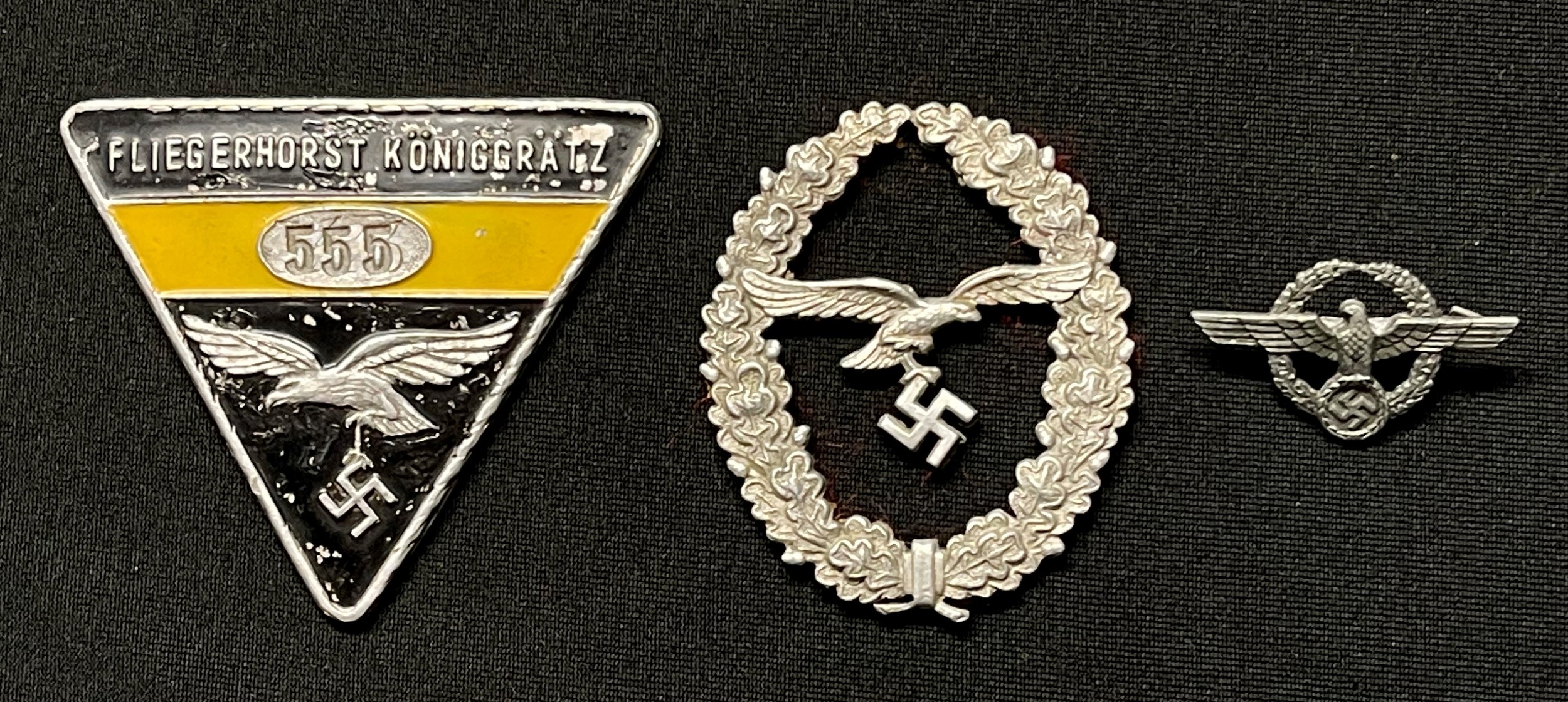 WW2 Third Reich Luftwaffe Fliegerhorst Koniggratz identity badge: Luftwaffe Marksmans lanyards badge, no pins: Wehrmacht Civil Employee Faithful Service Lapel badge. (3)