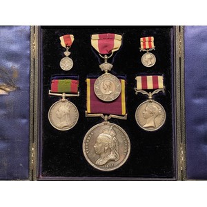 Medal Group to Major A England, X Bengal Lancers comprising of Indian Mutiny Medal, Abyssinian War Medal, Afganistan Medal 1878-79-80, Empress of India Medal 1877. Along with miniatures of the Abyssinian and Afganistan medals. All complete with original ribbon an housed is a period fitted display case. NOTE: Major England's sword is also included as lot 3091 in this sale.