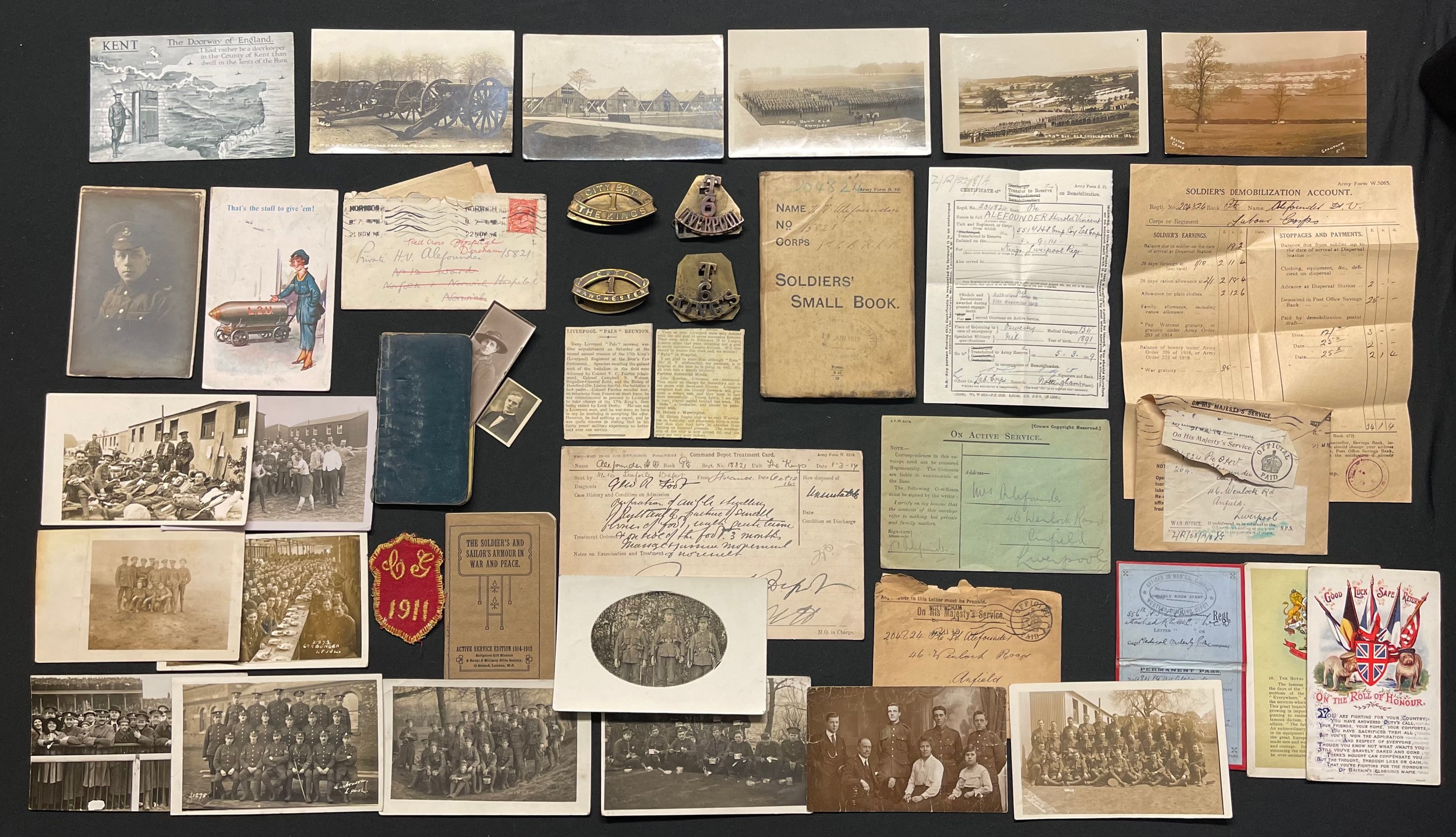 WW1 British Liperpool Pals group to 15821 Pte Harold Vincent Alefounder, Liverpool Regt (later 204824 Labour Corps) comprising of four brass shoulder titles, one T6 Kings, one T6 Liverpool, one 17th Battalion, The King's (Liverpool Regiment) (1st City & Liverpool Pals) and one 1 City Manchester Pals. Together with a comprehensive set of photos inc one portrait photo showing cap badge and official paperwork. Two large folders of prints "The Magic of the Mersey" featuring shipping scenes. (New to the market. Note his Son's WW2 RAF Photos and Paperwork are also in this sale.)