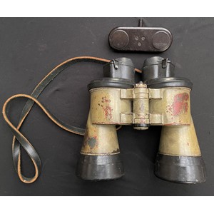 WW2 Third Reich German U-Boat 7x50 binoculars, maker marked "blc" along with serial number 55317. Complete with rubber armoured covers and original black leather neck strap plus bakelite lens cover marked "Benutzer". Original paint finish.