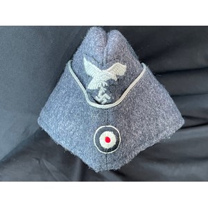 WW2 Third Reich Luftwaffe Officers Fliegermutze in good quality wool with enlisted mans quality insignia and silver bullion wire applied to the turn up. Grey rayon lined with a light grey faux leather sweatband. Size 57 1/2. No makers mark.