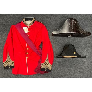 Uniform of a Colonel on the Un-Attached list, worn by Prince Ernest Augustus, circa 1878. Prince Ernest Augustus of Hanover, Duke of Brunswick-Lüneburg, Prince of Great Britain and Ireland: Fore and Aft Hat maker marked "Cater & Co. 56, Pall Mall, London" complete with original transit tin and his Scarlet Full Dress Tunic with crimson silk sash. The tunic has loops for his awards in place. As worn by Ernest Augustus II, 3rd Duke of Cumberland during his visit to the Prince of Wales in 1878 where he met his future wife, the then Princess of Denmark. Comes with the previous lot labels from Sotherbys and Wallis and Wallis.