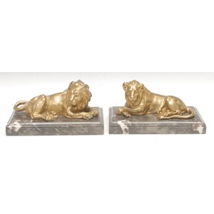 Italian School (early 20th century), a pair of figural gilt bronzes, Lion and Lioness, after the Lions of Nectanebo, in the Grand Tour Manner, veined marble moulded rectangular bases, the lion 12cm high, 24cm long overall