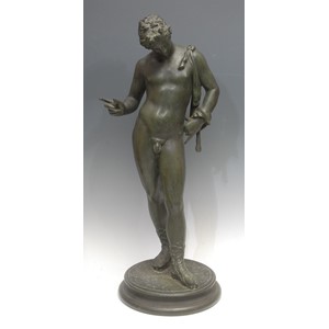 A Continental verdigris bronze effect sculpture, Dionysus, called Narcissus, in the Grand Tour manner, he stands in the contrapposto pose after the Pompeiian, socle base, 61cm high overall