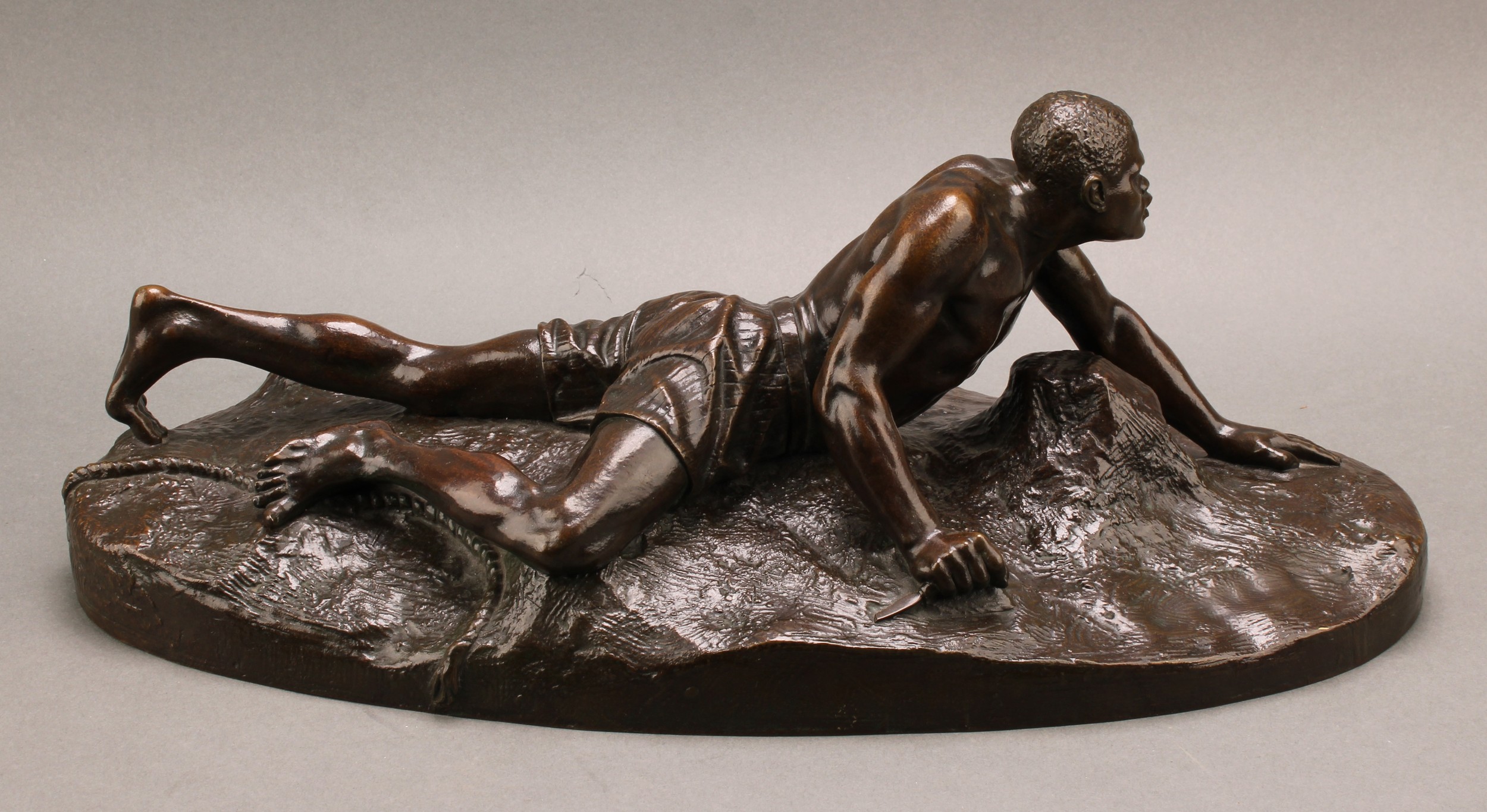 Anton van Wouw (1862-1945), by, Victor Van Hove (Belgian, 1826-1891), after, a dark patinated bronze, La Vengeance de L'Esclave, the base impressed Fond. Nisini, Roma, A. van Wouw, S.A. Joh-burg - 1907., 42cm wide  Anton van Wouw is well known for his portraits of the Shangaan, the indigenous people who lived in southern Mozambique and in the Northern Transvaal or Limpopo province of South Africa. He produced numerous small-scale sculptures, mainly of Boer and African figures, that were cast to order by the Giovanni Nisini and Galileo Massa foundries in Rome.