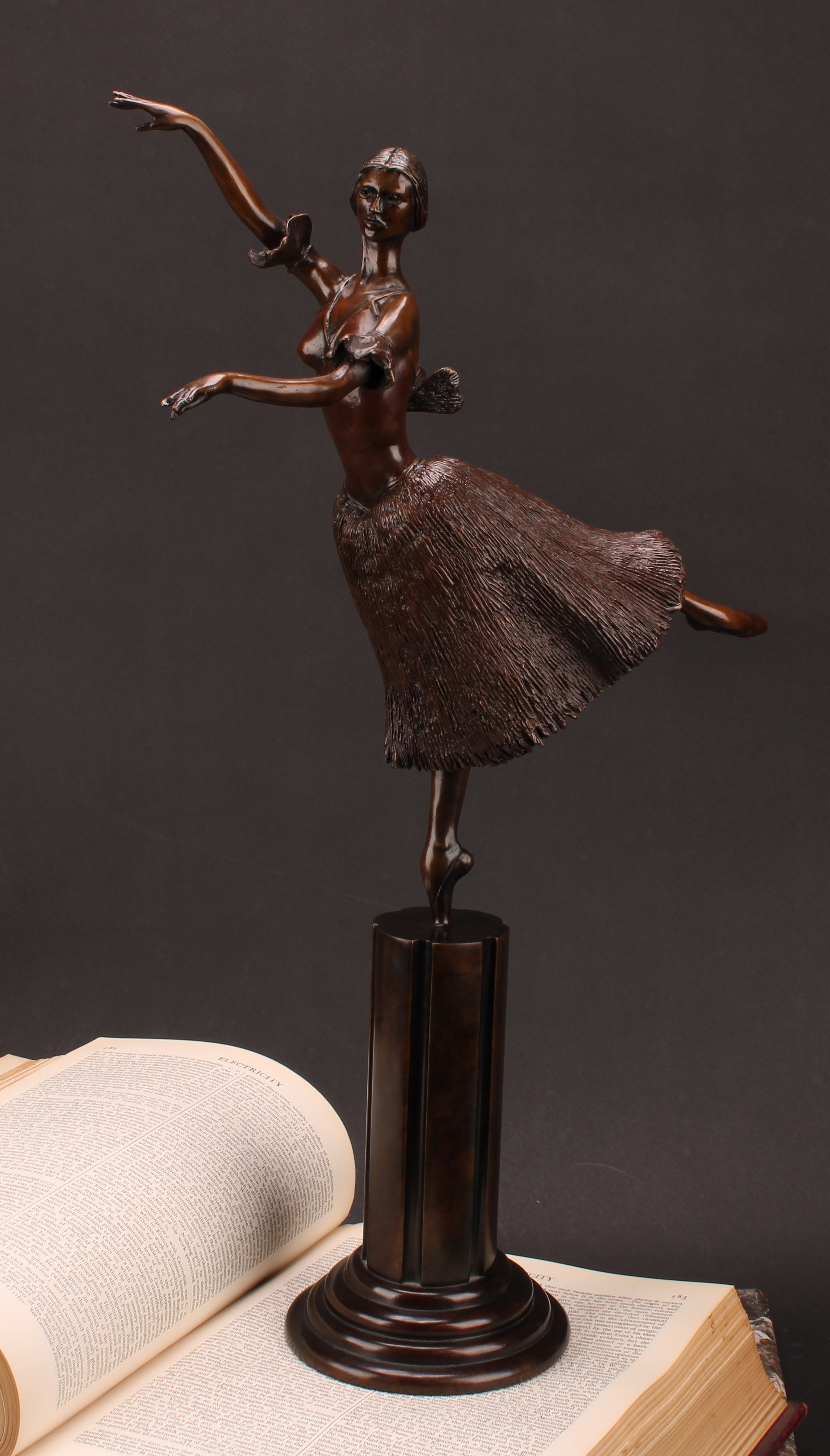 Tom Merrifield (1932-2021), a bronze figure of a ballerina, Giselle, numbered 1/8, fluted column on a stepped circular base, signed in the maquette, 55.5cm high overall