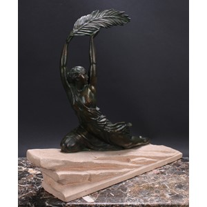 LE FAGUAYS, PIERRE (1862 - 1962)  Triomphe, an Art Deco patinated bronze, female figure, semi-clad holding aloft a single laurel leaf, kneeling upon a rocky sandstone outcrop, 49cm high, signed Fayral in the maquette, c.1920