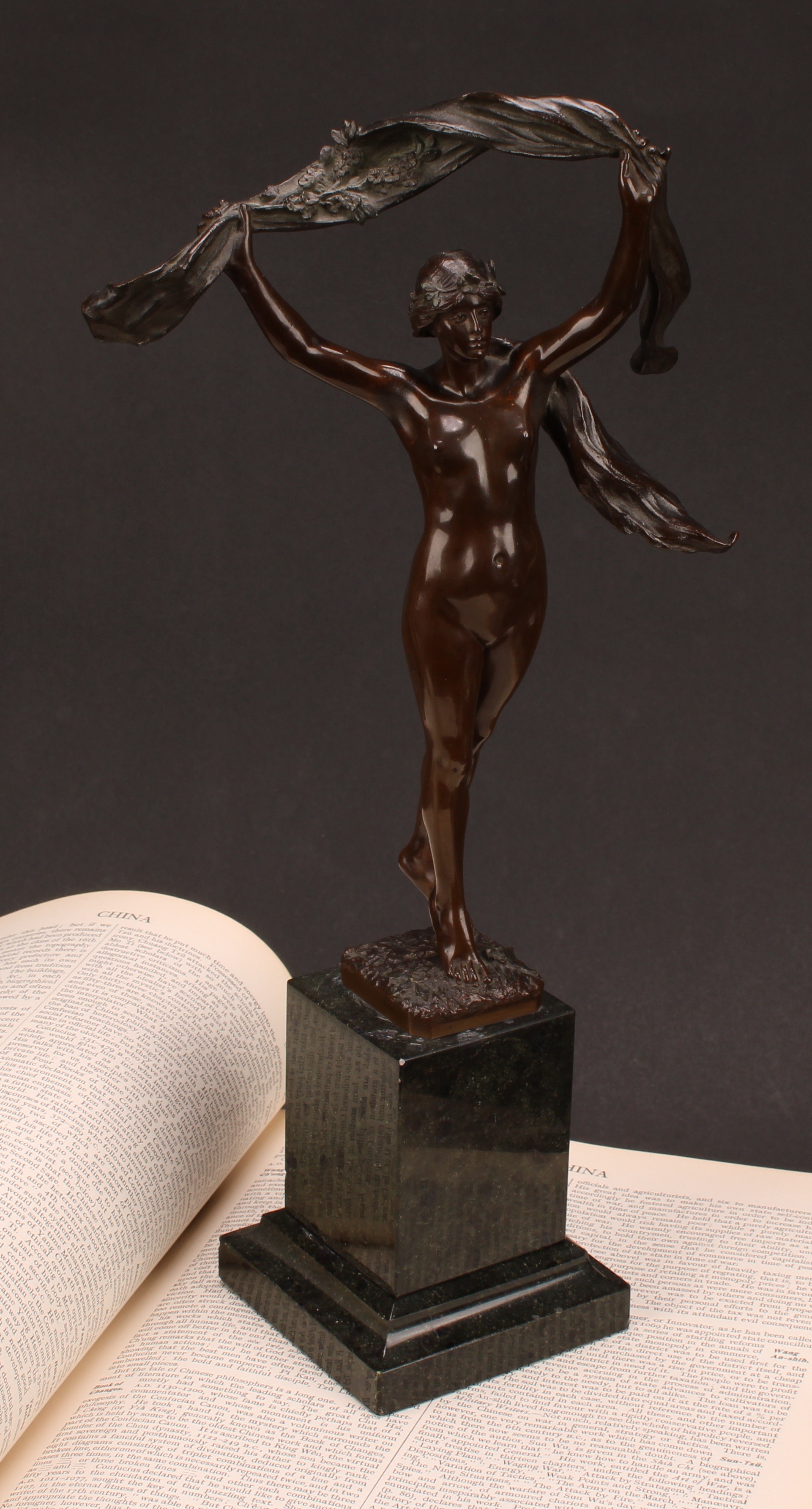 Manner of Louis-Ernest Barrias, an Art Nouveau period dark patinated bronze, Scarf Dancer, inscribed Akt=Ges:v.H.G&S., (Aktien-Gesellschaft Gladenbeck), 34cm high, c.1900