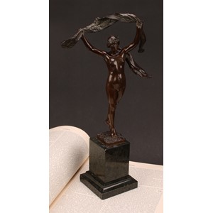 Manner of Louis-Ernest Barrias, an Art Nouveau period dark patinated bronze, Scarf Dancer, inscribed Akt=Ges:v.H.G&S., (Aktien-Gesellschaft Gladenbeck), 34cm high, c.1900