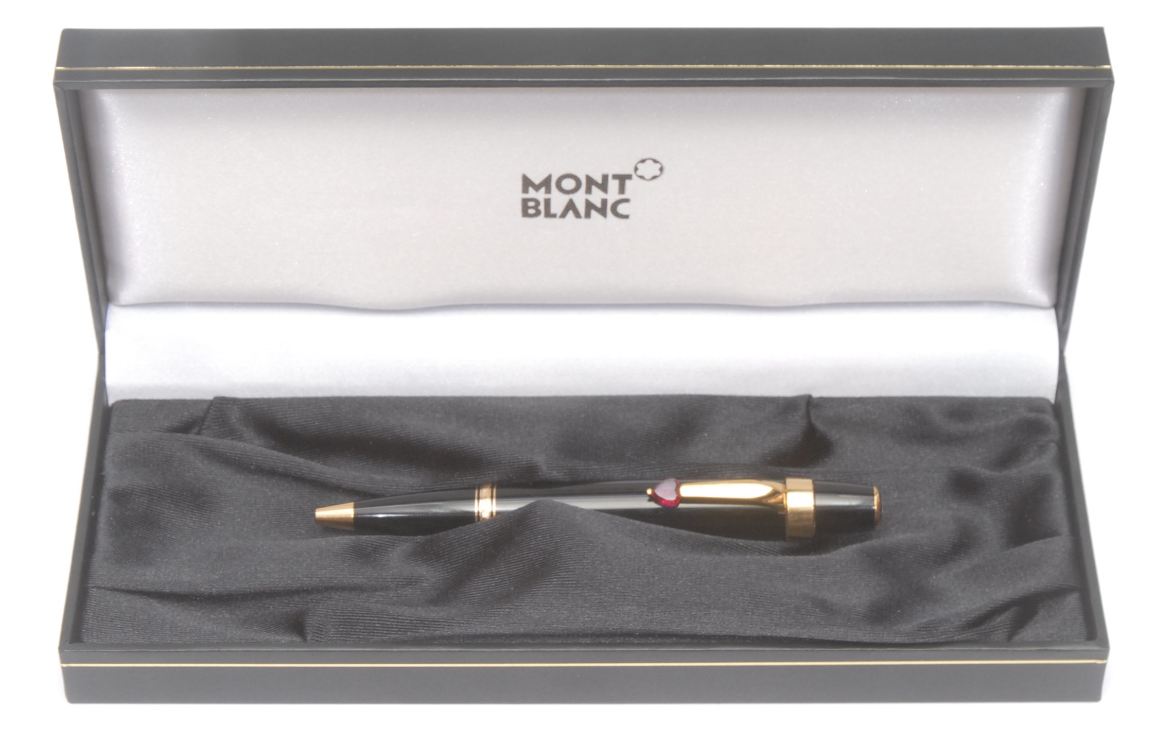 A Montblanc Boheme Je T'aime rollerball pen, model number GLL014854, the clip mounted with a heart-shaped red stone, 11cm long overall, boxed with service guide and warranty dated June 1st 2006