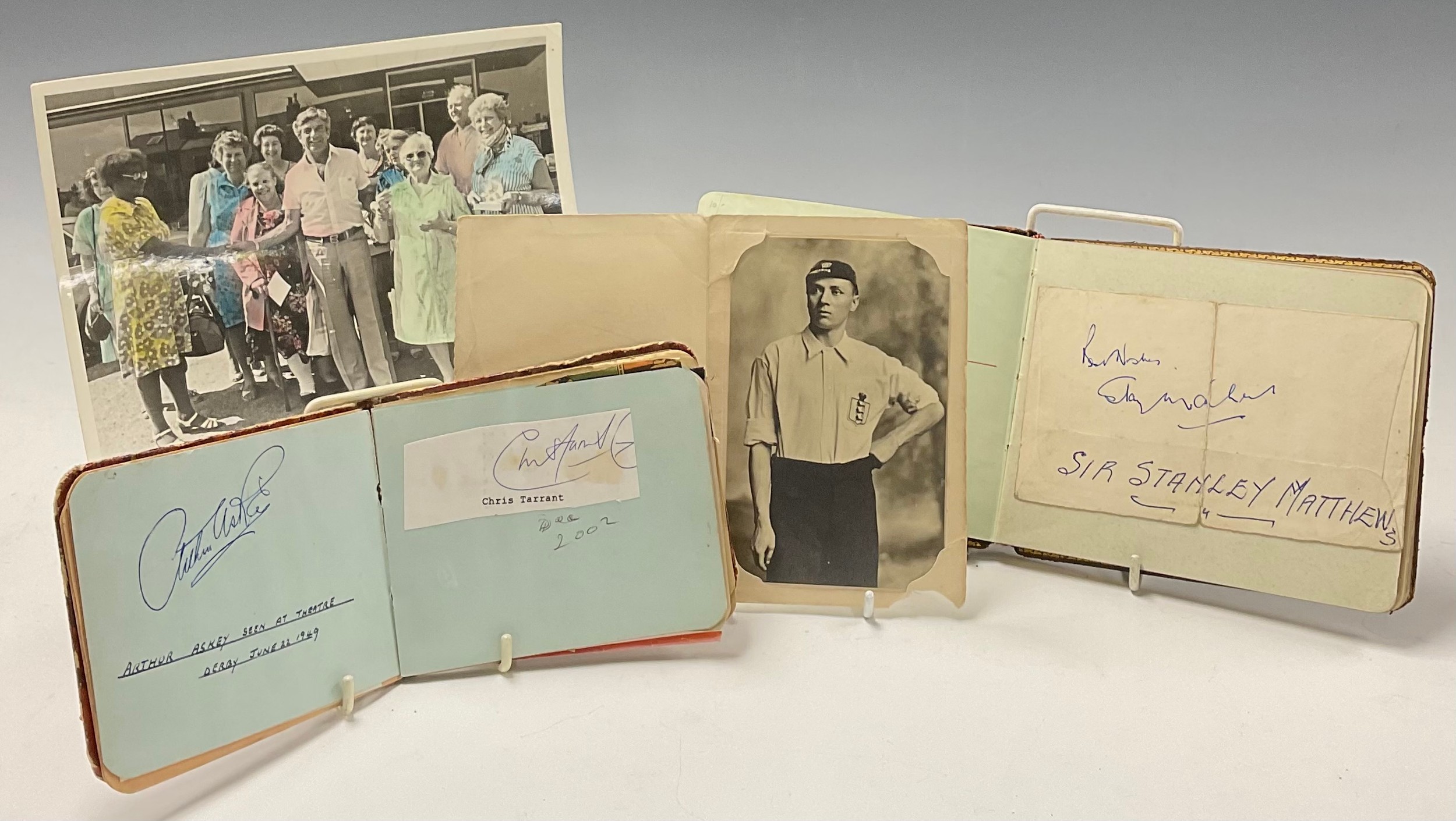 Autographs and Football Memorabilia - a W.W. Winter collector's photograph card of Steve Bloomer (1874-1938), apparently apocryphal signature to front, the picture 13.5cm x 9cm, c. 1905; an autograph booklet containing the signatures of Frankie Vaughan, Geraldo, Chris Tarrant, Michael Hesseltine, Normal Hartnell, etc; another containing Sir Stanley Matthews and apparently apocryphal signatures of Gracie Fields, Greta Garbo, Little Richard; a photograph of the owner and others with Frankie Vaughan (4)
