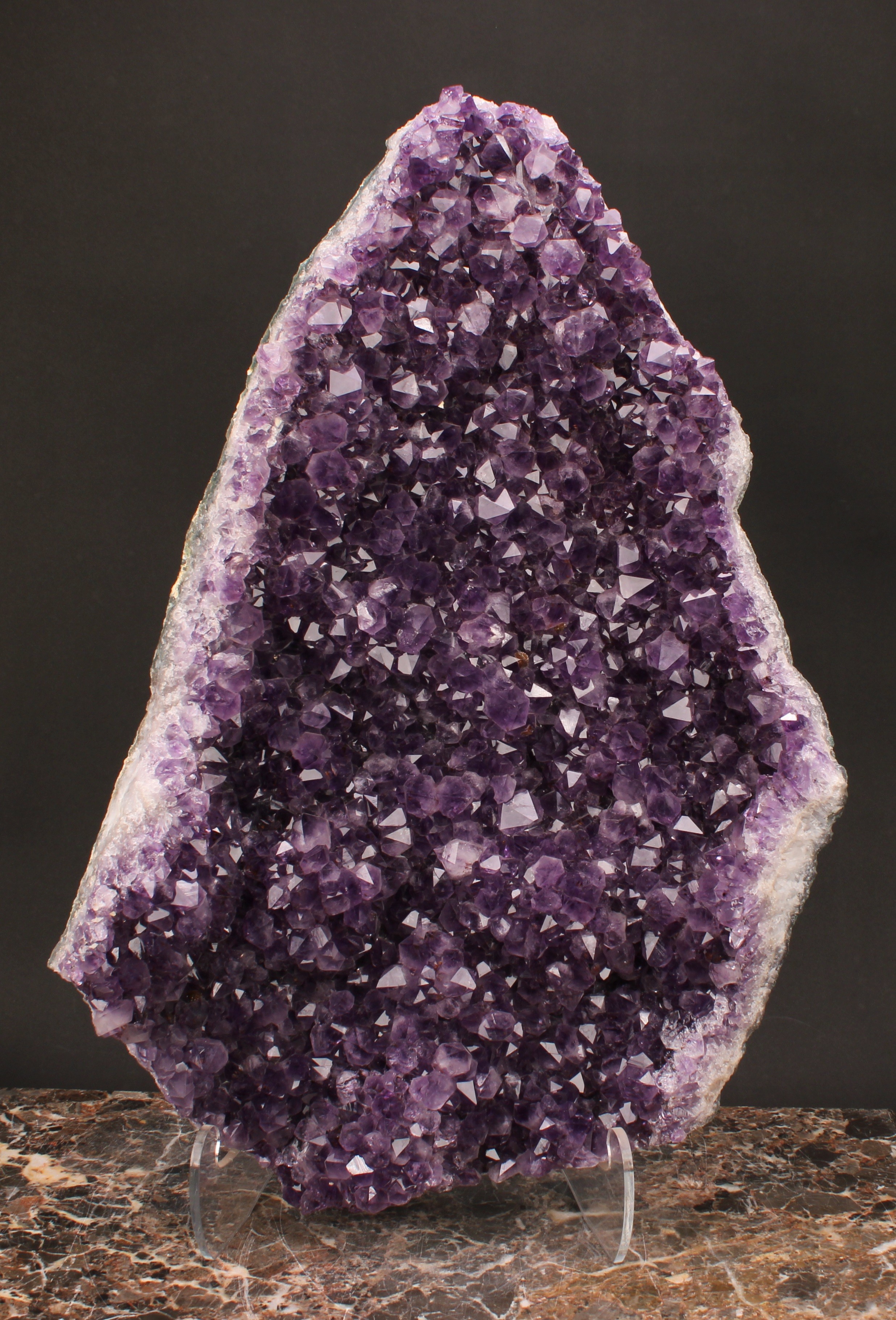 Geology - a large amethyst geode specimen, 59cm high, 39cm wide
