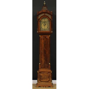 A George III mahogany musical longcase clock, 30.5cm arched brass dial inscribed Peter Paulsen, Zeist, Roman and subsidiary Arabic numerals, subsidiary seconds dial, date aperture, triple winding holes, eight day movement striking on a nest of eighteen and one single bell, air, strike/silent and play/not play selectors to arch, one additional cylinder, the case with pagoda top set with blind fretwork panels, shaped rectangular door flanked by stop-fluted quarter-columns, 265cm high, 53cm wide, 26cm deep