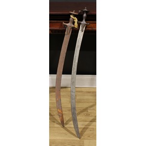 From the collection of Alan Dunmore, Old rectory, Rangemore, Staffordshire  A 19th century Indian talwar, 81cm curved blade inscribed with two panels of verse, bowed knuckle guard, disc pommel, 94cm long overall; another (2)