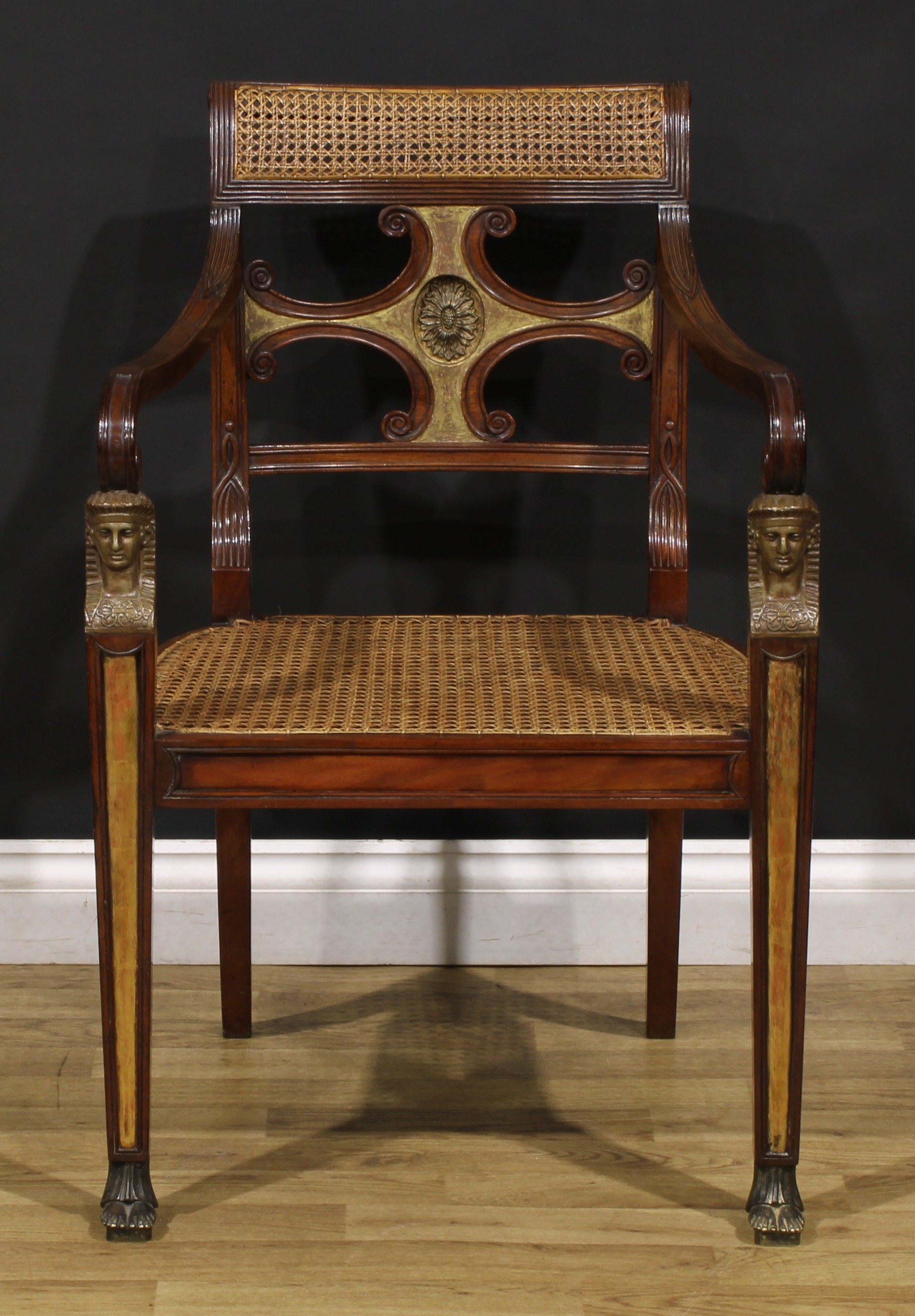 An interesting early 19th century parcel-gilt mahogany elbow chair, reputedly once belonging to Marie Antoinette Murat (3 January 1793 – 19 January 1847), applied to verso with a plaque inscribed THIS CHAIR OF THE NAPOLEONIC PERIOD BELONGED TO PRINCESS MURAT AND WAS PRESENTED TO THE BOURNEMOUTH NATURAL SCIENCE SOCIETY BY FIELD MARSHAL LORD GRENFELL, G.C.B., G.C.M.G., F.S.A. BEING A PART OF HIS NAPOLEONIC COLLECTION. FEBRUARY 1920., 86.5cm high, 57cm wide, the seat 47cm wide and 37cm deep, c.1810  Marie Antoinette Murat was Princess of Hohenzollern-Sigmaringen as the wife of Karl, Prince of Hohenzollern-Sigmaringen. She was by birth member of the House of Murat. Marie Antoinette was the niece of Joachim Murat, King of Naples from 1808 to 1815 and a brother-in-law of Napoleon Bonaparte, through marriage to Napoleon's youngest sister, Caroline Bonaparte.