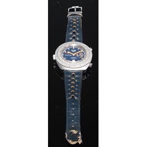 Heuer - a Calculator, ref. 150.633, a stainless steel chronograph wristwatch, no. 284636, circa 1970s, automatic movement,  deep blue dial with applied luminous baton markers, orange luminous pointed hour and minute hands, white sub dial hands, orange seconds hand, date aperture to 6 o’clock, silver rotating slide rule bezel, screw down case back, case, dial and movement signed, on a conforming leather strap with signed pin buckle, diameter 45mm.