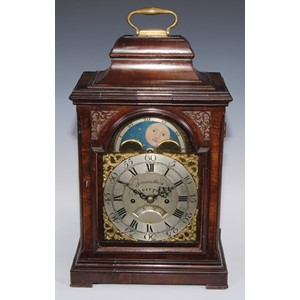 A George III mahogany bracket clock, 17cm arched brass dial with silver chapter ring, inscribed James Park, Liverpool, rolling moonphase to arch, date aperture, twin winding holes, eight-day fusee movement with anchor escapement striking on a bell, the pagoda case with brass carrying handle, glazed sides with pierced sound-frets, bracket feet, 47cm high, c.1770