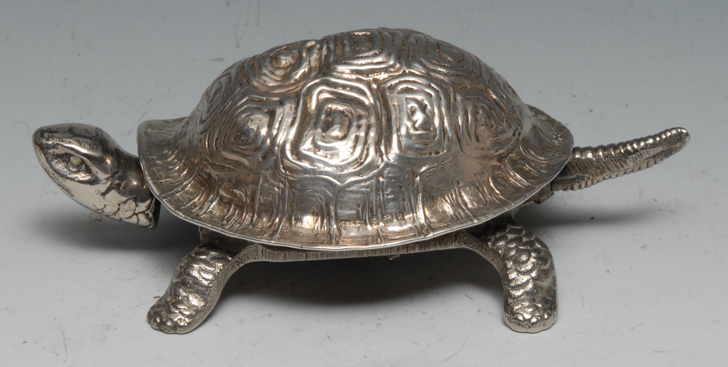 An Edwardian silver novelty desk or counter bell, as a tortoise, 14.5cm long, Grey & Co, Birmingham 1909