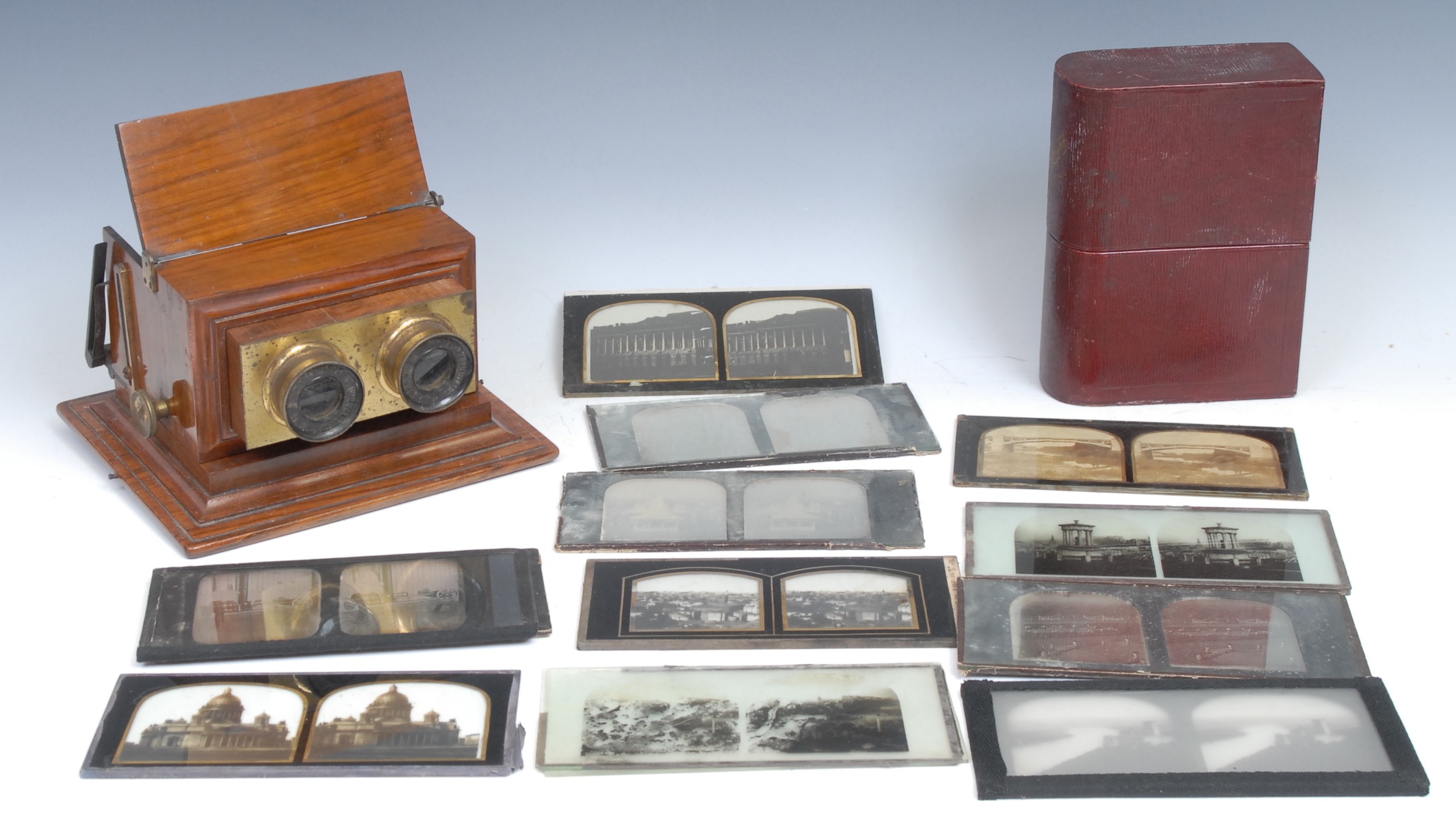 Photography - The Stereoscope - a 19th century walnut table top stereoscopic viewer, Smith, Beck & Beck, London, 20cm wide; a collection of glass slides including the opening of The Crystal Palace, 1856, etc