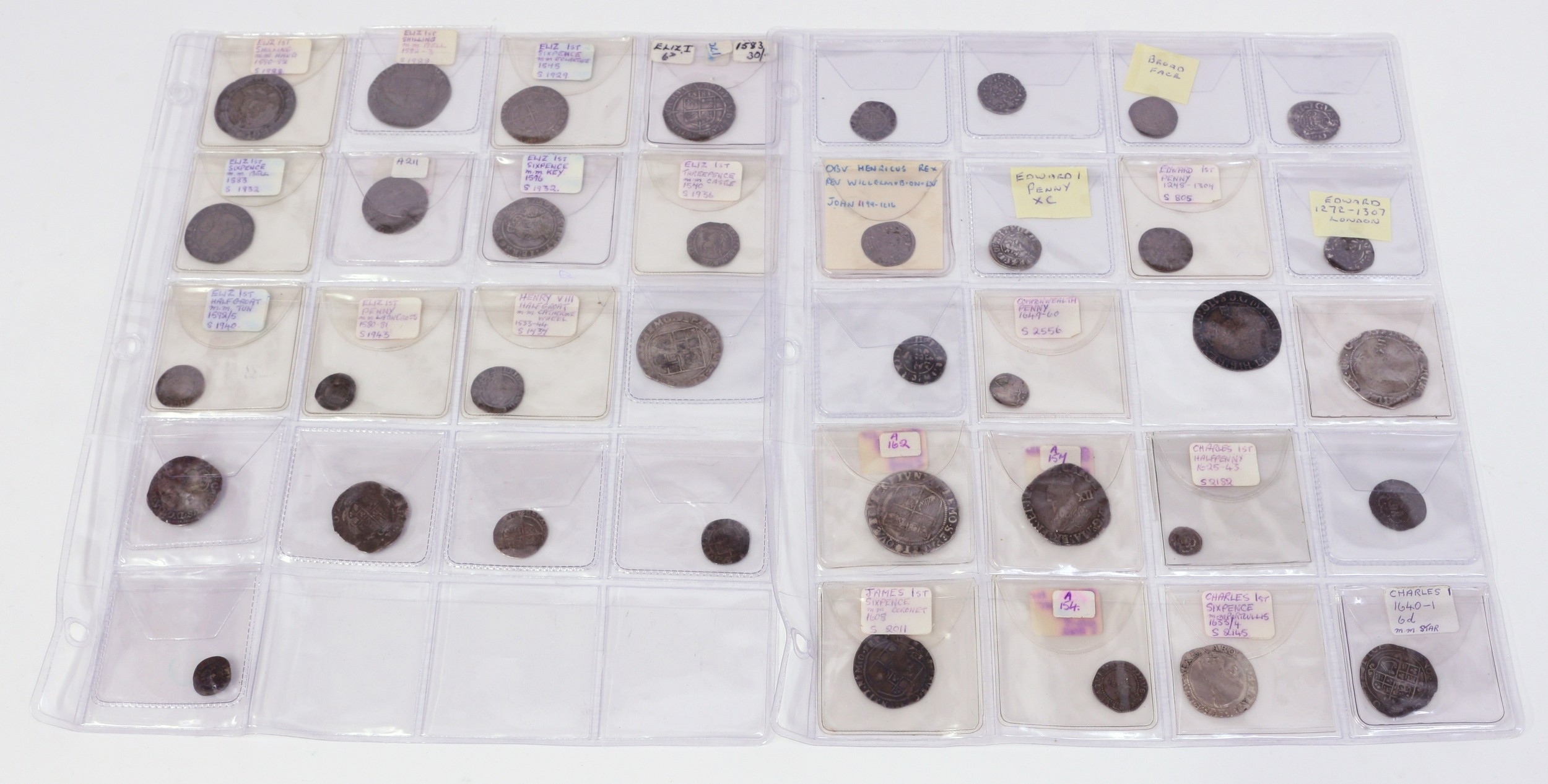 A collection of English hammered coins, including short cross pennies Henry II broad face GF; John, Willem B/London GF; Edward I; Edward IV half groat AF; Henry VIII two pence 1533/44 mm Catherine wheel F Elizabeth I shilling 1582/83 mm. bell AF, 1590 mm hand AF; sixpences 1575 mm. eglantine, 1583 mm. Gothic A AF, another, mm. bell AF, 1591 mm. hand Fair; 1596 mm. key AF; three pence 1570 mm castle F, twopence third issue 1565 AF another 5th issue Fair, also 1592/95 mm tun F; penny 1580/81 mm. Latin cross AF; James I: shilling second coinage 1613/15 mm 5-foil AF, another third bust mm. escallop GF, sixpence 1607 AF, twopence second coinage AVF; Charles I shillings: round shield, no lines AF, sixpence 1633/34 mm portcullis F, 1639/40 XII behind head tower mint mm. D,  another mm (R) AF1640/41 mm star F; sixpences 1633/34 mm. portcullis F, 1640/41 mm. star F, tower mint two both slightly folded; silver halfpenny F; AE rose farthing double arched crown, double rose sceptres within inner circle F; Commonwealth penny AF flan slightly bent (qty)