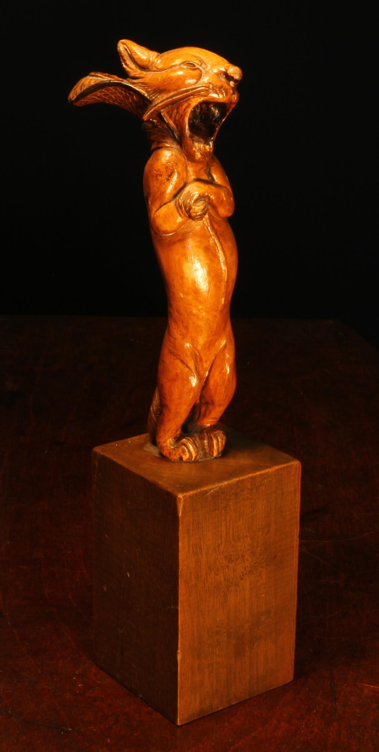 Alfred Lyndhurst Pocock (1882 - 1962), a laburnum carving, The Sleepy Dormouse, From Alice in Wonderland, 16.5cm high, signed with monogram, mounted for display, 26.5cm high overall; a preparatory sketch, charcoal drawing heightened in white, 25cm x 10.5cm (2)  Exhibited: Royal Miniature Society, Arlington Gallery, 22 Old Bond Street, 1935. Lai Glen Restaurant Coffee Room, Old Church Street, Chelsea, 1957