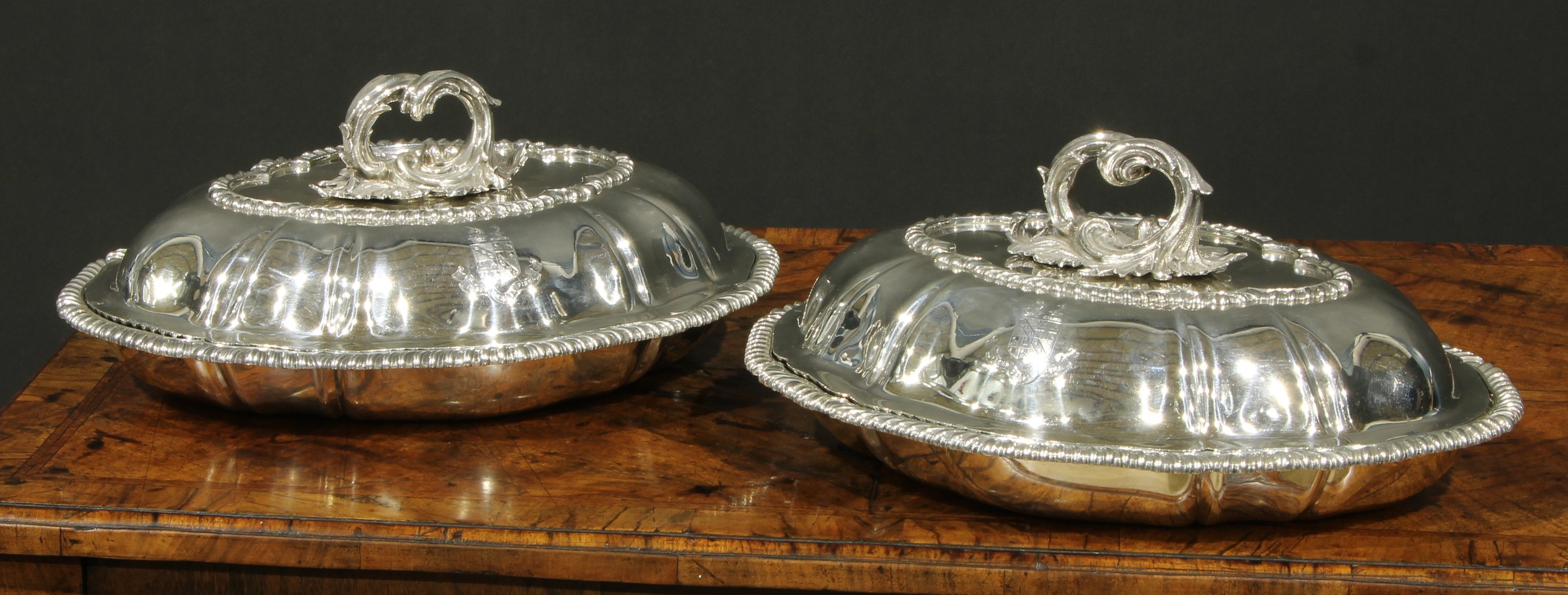 A pair of Victorian fluted oval entree dishes, acanthus scroll bayonet loop handles, gadrooned borders, 32cm wide, Edward & John Barnard, London 1852, 3760g