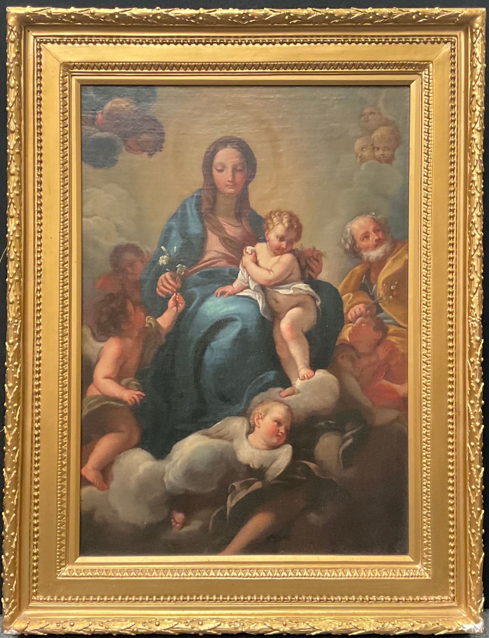 Circle of Carlo Cavaliers Maratti (1625 - 1713) Madonna and Child Attended by Putti in the Heavens oil on canvas, 68cm x 47.5cm   Provenance: Ink MS. label to verso reading Carlo Maratti, his study for Madonna part of his big painting in Pitti Gallery Florence apparition of [our] Lady to St Phillip... brought by my grandfather and his father in Florence when doing the "grand tour",  Ida S North***