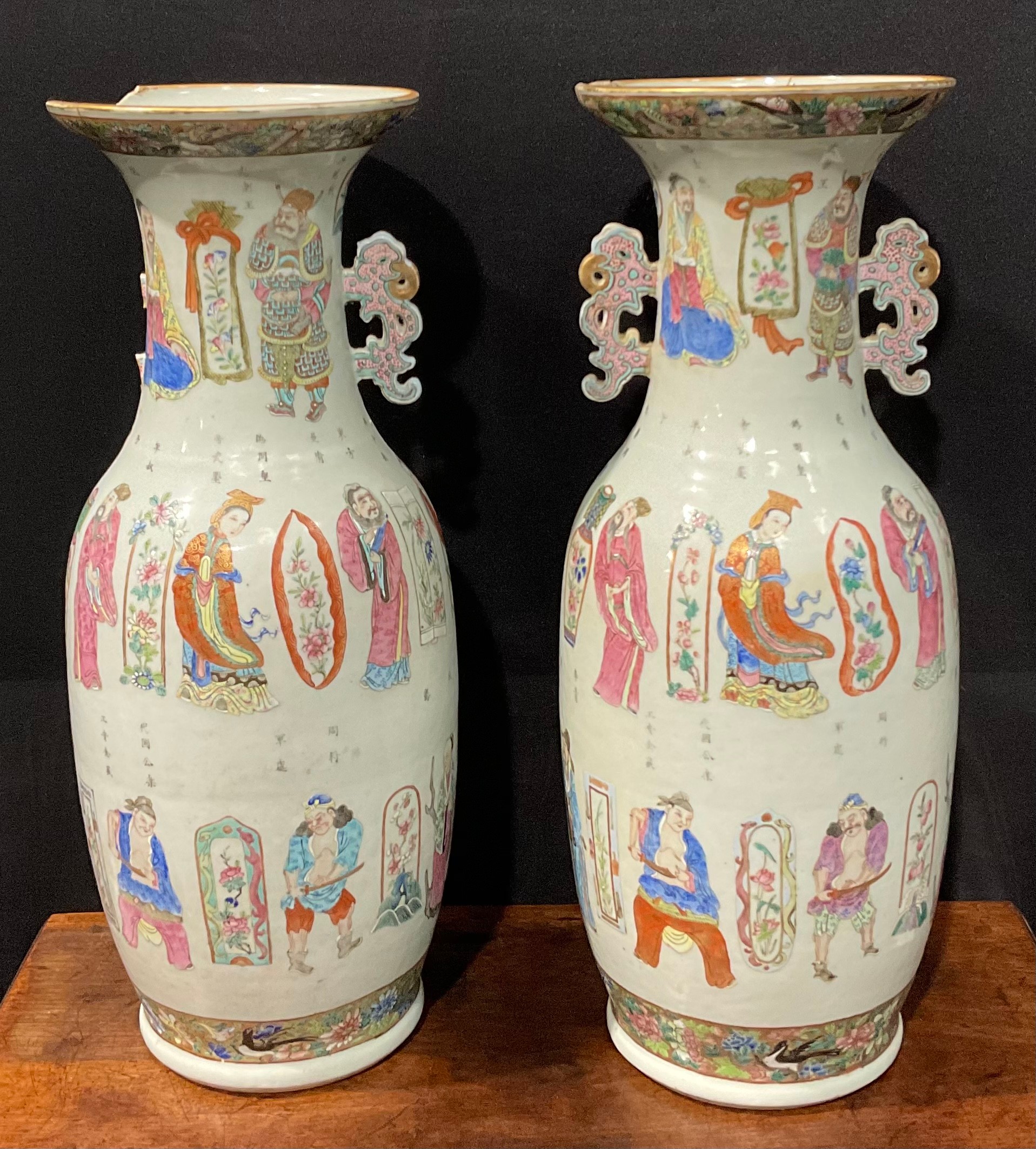 A pair of 19th century Chinese ovoid vases, painted in polychrome enamels in the famille rose palette with bands of figures in narrative scenes, the ground with calligraphy and verse, 64cm high, 19th century