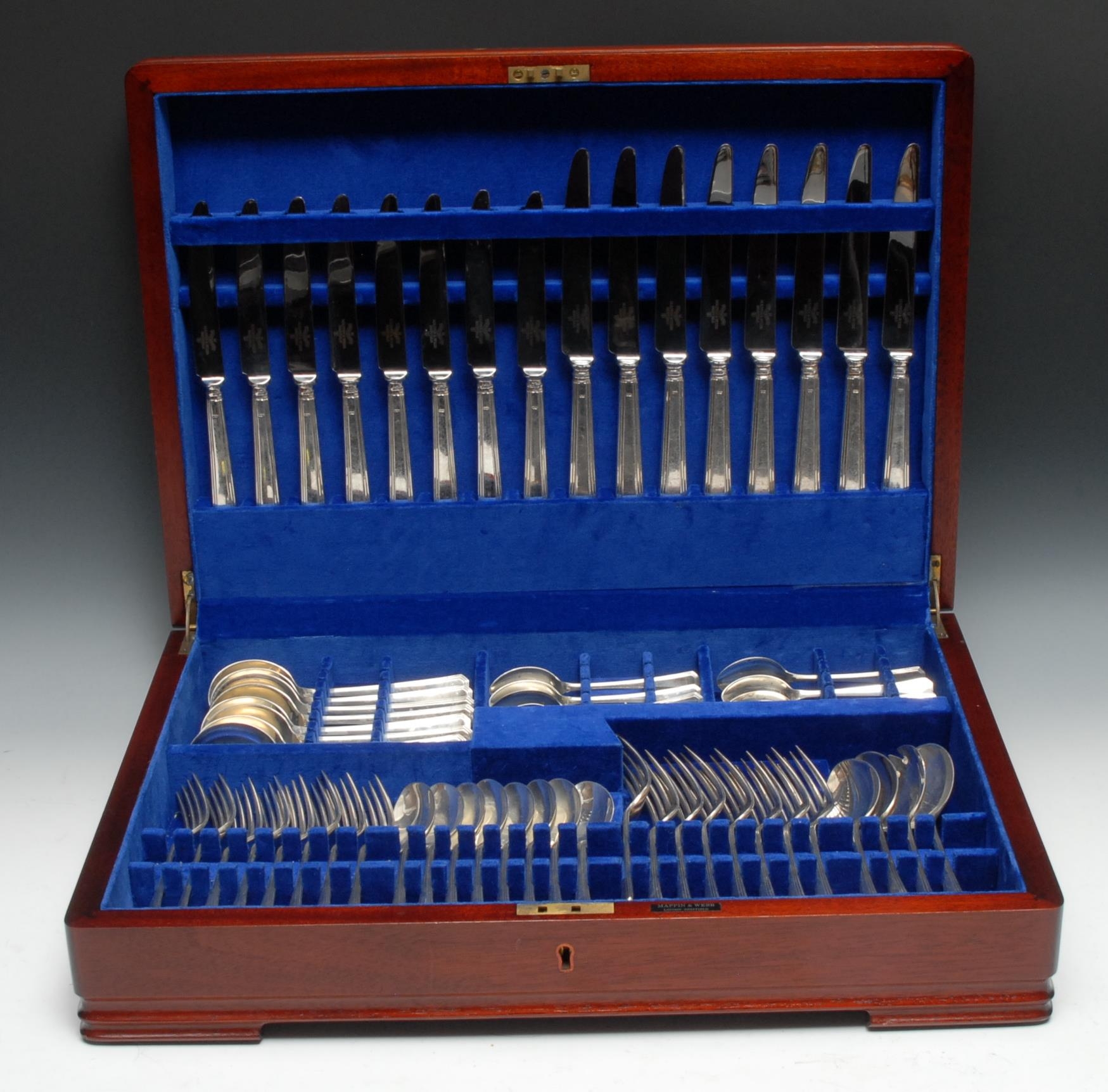 An Elizabeth II silver Harley pattern canteen of flatware, for eight, comprising soup spoons, table knives, table forks, dessert knives, dessert forks, dessert spoons,teaspoons, a pair of dessert spoons and a pair of salad servers, Mappin & Webb, Sheffield 1995, cased, 2670g weighable silver