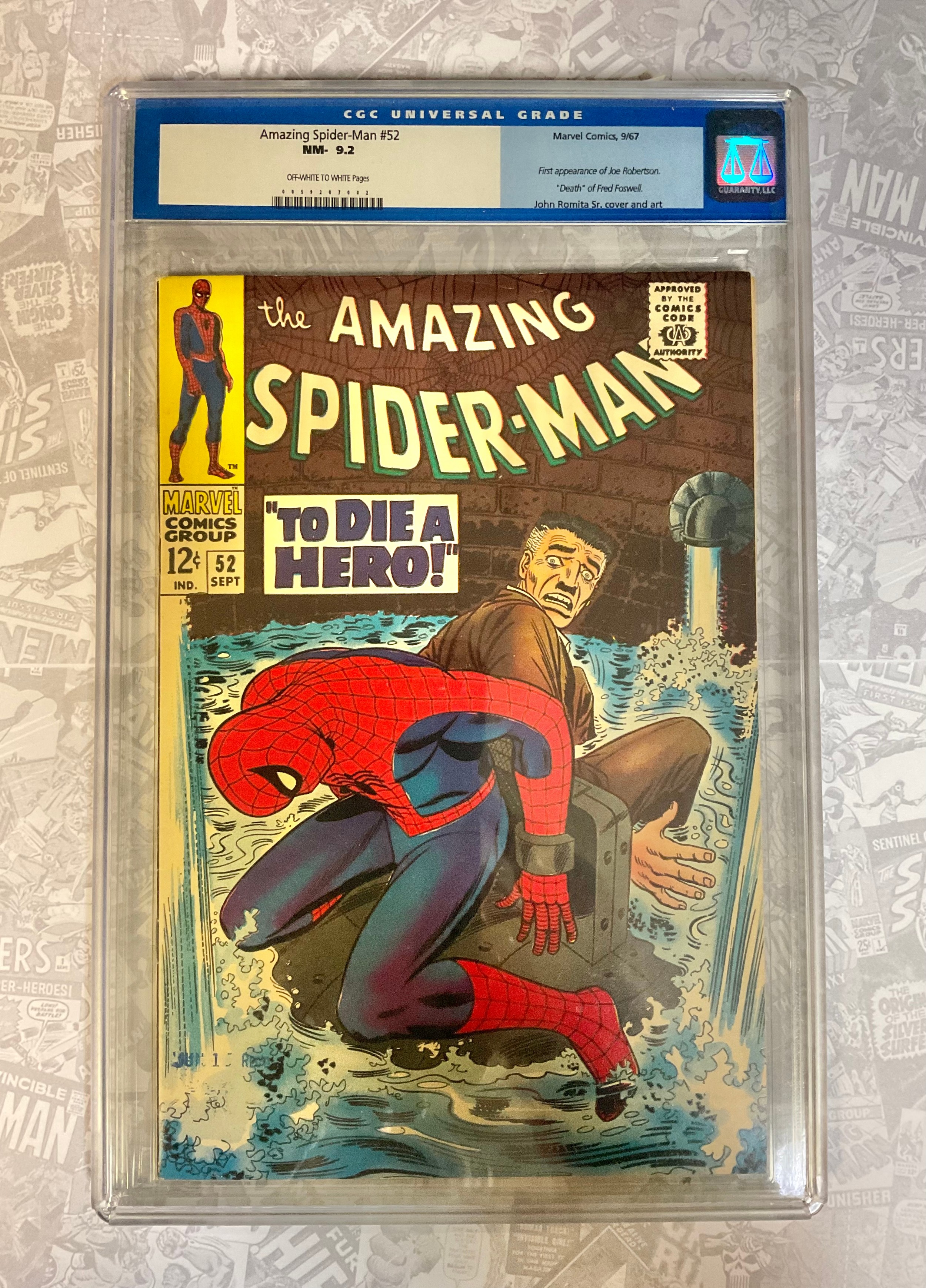 The Amazing Spider-Man #52 (1967). CGC Graded 9.2 NM-. 1st appearance of Joe Robertson. John Romita Snr artwork. Silver age Marvel Comic.